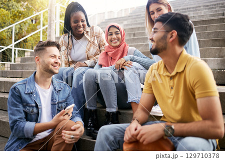 Relax, diversity or students on steps at break talking or speaking of goals, education or future plan. Group, school or happy friends in university or college bonding in a fun social conversation Relax, diversity or students on steps at break talking or speaking of goals, education or future plan. Group, school or happy friends in university or college bonding in a fun social conversation 129710378