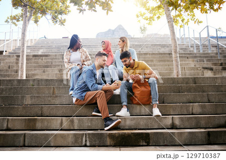 Relax, phone or students on steps at lunch break talking or speaking of future goals or education on campus. Social media, school or happy friends in university or college bonding in fun conversation 129710387