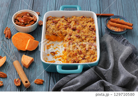 sweet potato casserole with pecan streusel topping 129710580