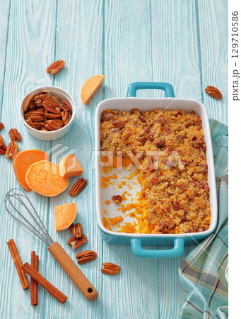 sweet potato casserole with pecan streusel topping 129710586