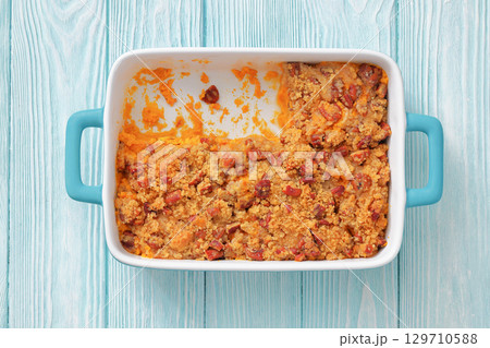 sweet potato casserole with pecan streusel topping sweet potato casserole with pecan streusel topping 129710588