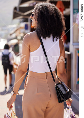 Happy young woman, shopping bags or retail city fashion for luxury clothes, self care spree or luxury mall sales. Smile, fun or trendy customer gifts in Brazilian urban street or relax street market 129710609