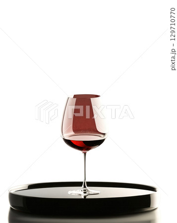 Delicate Pinot Noir glass, cradling light red wine, isolated on transparent, dynamic stem, reflections, creative dish, 129710770