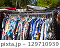 second hand clothes, colorful vintage clothings on fashion flea market 129710939