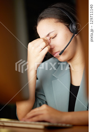 Stress, headache and call center woman on computer telemarketing fail, anxiety or burnout in global, virtual customer support. Tired, fatigue financial advisor or consultant frustrated, sad or angry Stress, headache and call center woman on computer telemarketing fail, anxiety or burnout in global, virtual customer support. Tired, fatigue financial advisor or consultant frustrated, sad or angry 129711140