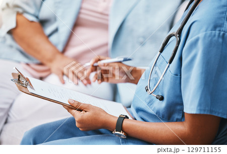Clipboard, nurse hands and patient checklist for healthcare questions, research and medical history data. Closeup doctor writing notes, planning and consulting documents for help, trust and medicine 129711155