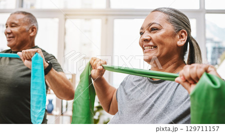 Physiotherapy, stretching band and senior couple with teamwork for muscle wellness, rehabilitation and support together. Elderly black people or friends smile in physical therapy with strong progress 129711157