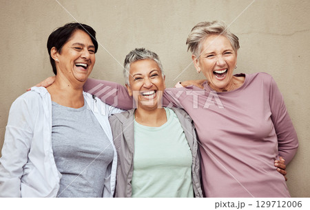Senior women, group and laughing for fitness, workout or happiness of healthy lifestyle together. Mature female friends relax after training, wellness and funny retirement exercise on wall background Senior women, group and laughing for fitness, workout or happiness of healthy lifestyle together. Mature female friends relax after training, wellness and funny retirement exercise on wall background 129712006