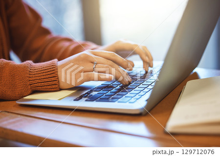 Woman with hands, laptop and student typing, education and writing report or essay, studying for exam at university. Scholarship, college student zoom and proposal, keyboard with email and wifi 129712076