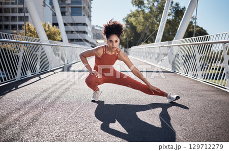 Stretching legs, fitness portrait and woman on city bridge exercise, runner and training in sports shoes fashion. Warm up, focus and urban athlete on ground workout for body, muscle and health goals Stretching legs, fitness portrait and woman on city bridge exercise, runner and training in sports shoes fashion. Warm up, focus and urban athlete on ground workout for body, muscle and health goals 129712279