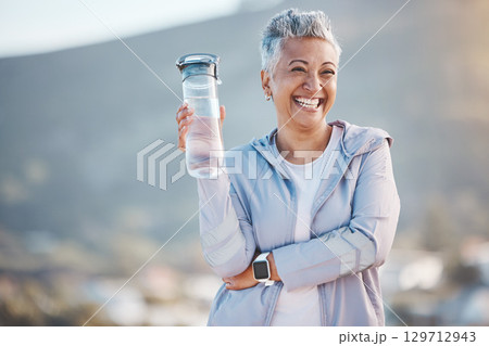 Fitness, happy or old woman with water bottle in nature to start training, exercise or hiking workout in New Zealand. Portrait, liquid or healthy senior person smiles with pride, goals or motivation Fitness, happy or old woman with water bottle in nature to start training, exercise or hiking workout in New Zealand. Portrait, liquid or healthy senior person smiles with pride, goals or motivation 129712943