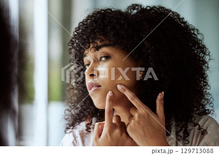 Black woman, mirror and facial pimple cleaning for beauty hygiene, skincare wellness and cosmetics dermatology in bathroom. Young African girl, checking face acne and hands for self care cosmetology 129713088