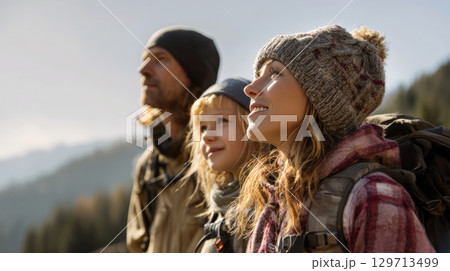Embark on outdoor journey with family of explorers, featuring woman, man, child. Themes of spirit of adventure, family bonding, love for great outdoors, travel, active lifestyles, eco tourism 129713499