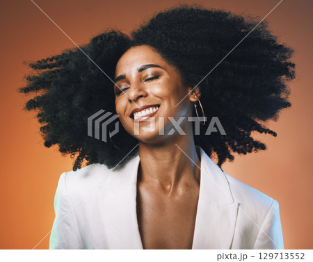 Black woman, beauty and hair with hair care and happy with afro, makeup with cosmetic care, face and skincare. Dance, freedom with facial and natural curly hair texture against studio background 129713552