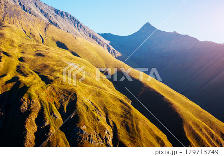 Captivating scene of the main Caucasus ridge. Captivating scene of the main Caucasus ridge. 129713749