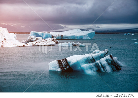 Large pieces of the iceberg in Jokulsarlon lagoon. Vatnajokull national park, Iceland. Large pieces of the iceberg in Jokulsarlon lagoon. Vatnajokull national park, Iceland. 129713770