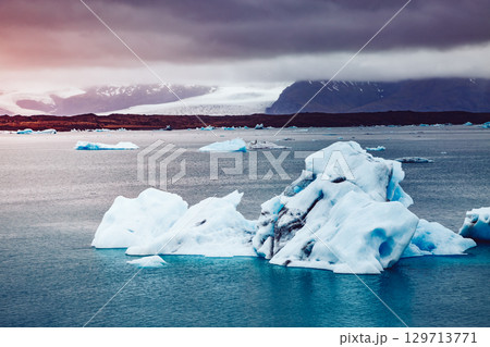 Large pieces of the iceberg in Jokulsarlon lagoon. Vatnajokull national park, Iceland. 129713771