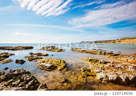 Breathtaking sea with white clouds. 129714056
