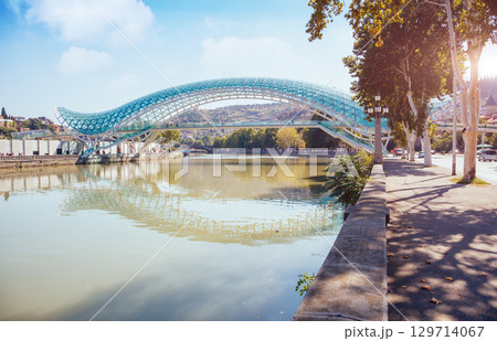Captivating scene of the bridge of Peace in Tbilisi town. Captivating scene of the bridge of Peace in Tbilisi town. 129714067