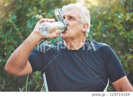 Exercise, senior man and water bottle for fitness, wellness and health in nature. Elderly male, athlete and hydration after training, rest and workout for cardio, power and energy in park and relax. Exercise, senior man and water bottle for fitness, wellness and health in nature. Elderly male, athlete and hydration after training, rest and workout for cardio, power and energy in park and relax. 129714184