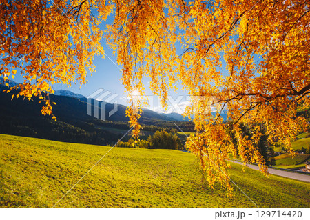 Magic image of sunny hills in Santa Magdalena village. Funes valley, Dolomite Alps. Magic image of sunny hills in Santa Magdalena village. Funes valley, Dolomite Alps. 129714420