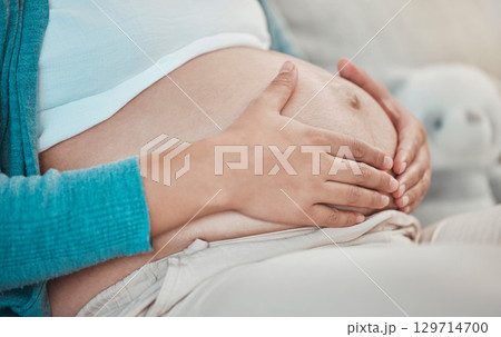 Pregnant, tummy and woman touching body to bond with her baby for maternity care with love. Bonding, pregnancy and mother touching her stomach to prepare for motherhood and being a parent Pregnant, tummy and woman touching body to bond with her baby for maternity care with love. Bonding, pregnancy and mother touching her stomach to prepare for motherhood and being a parent 129714700