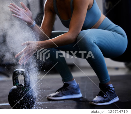 Woman, powder hands and kettlebell exercise, challenge and workout in gym, fitness club and body muscle. Zoom of bodybuilder, chalk and weightlifting, grip and weight training, performance and power Woman, powder hands and kettlebell exercise, challenge and workout in gym, fitness club and body muscle. Zoom of bodybuilder, chalk and weightlifting, grip and weight training, performance and power 129714719