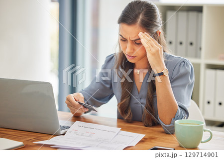 Stress, credit card or business woman with laptop confused with finance, burnout or budget depression in office. Document, bill or employee with headache for loan payment decline, debt anxiety or tax Stress, credit card or business woman with laptop confused with finance, burnout or budget depression in office. Document, bill or employee with headache for loan payment decline, debt anxiety or tax 129714901