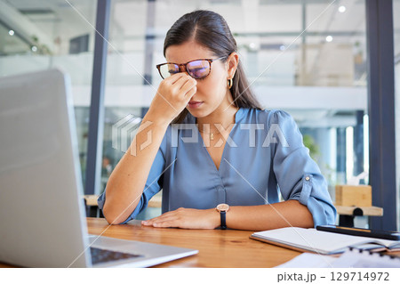 Stress headache, burnout and woman in office overwhelmed with workload at desk with laptop. Frustrated, overworked and tired woman with computer at startup, anxiety from deadline time pressure crisis Stress headache, burnout and woman in office overwhelmed with workload at desk with laptop. Frustrated, overworked and tired woman with computer at startup, anxiety from deadline time pressure crisis 129714972