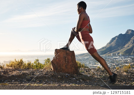Black woman, music earphones or fitness stretching in city view workout, training or exercise in marathon, healthcare wellness or muscle pain relief. Runner, sports athlete or person on warm up radio 129715181