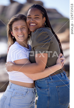 Portrait, women and friends hug with smile, vacation and weekend break. Females, girls and embrace for reunion, happiness and casual outdoor, cheerful and peace on holiday, trip and bonding together. 129715418