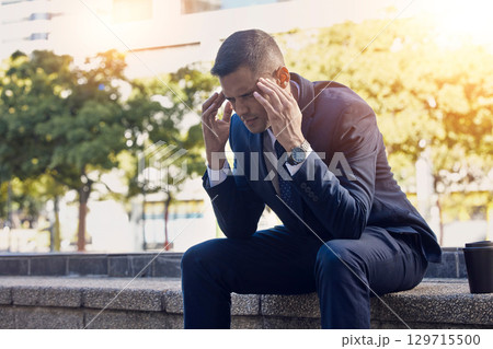Headache, urban and business man on a coffee break with stress, anxiety and employee burnout. Tired, professional and corporate lawyer with mental health problem from working and company project 129715500