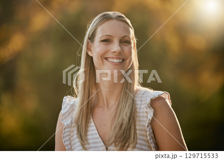 Face portrait, smile and happy woman on vacation, holiday or trip outdoors. Relax, freedom and smiling female from Canada on break, having fun or enjoying quality time alone in nature, park or garden 129715533