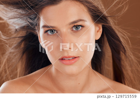 Beauty, hair and face with hair care, woman and cosmetics, keratin treatment and facial, makeup headshot and self care and skincare. Healthy skin, glow and wellness with natural and cosmetic portrait Beauty, hair and face with hair care, woman and cosmetics, keratin treatment and facial, makeup headshot and self care and skincare. Healthy skin, glow and wellness with natural and cosmetic portrait 129715559