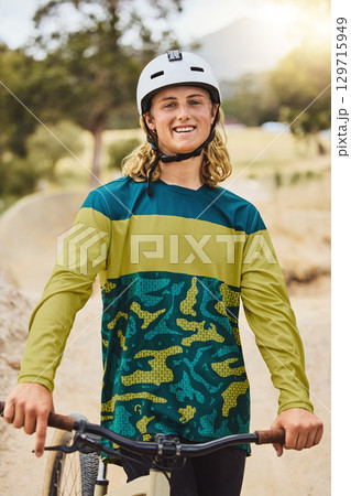 Mountain bike, cycling and man in portrait at a park or forest in safety gear helmet for sports goals, adventure and summer journey. Triathlon, athlete face and bicycle in Australia nature and trees 129715949