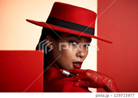 Fashion, red aesthetic and woman with lipstick in studio for beauty products, designer cosmetics and makeup. Creative art, luxury clothes and portrait of girl with trendy, edgy and elegant outfit Fashion, red aesthetic and woman with lipstick in studio for beauty products, designer cosmetics and makeup. Creative art, luxury clothes and portrait of girl with trendy, edgy and elegant outfit 129715977