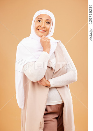 Muslim, fashion and portrait of woman in studio for beauty, business clothes and culture compliance in hijab for creative career. Designer, retail and islamic model idea, thinking and smile mock up 129716236