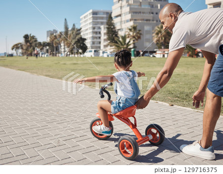 Child, girl or father pushing bike on city promenade for riding learning, cycling education or Brazilian freedom fun. Smile, happy or bonding man with kid on bicycle sports, wellness trust or games Child, girl or father pushing bike on city promenade for riding learning, cycling education or Brazilian freedom fun. Smile, happy or bonding man with kid on bicycle sports, wellness trust or games 129716375