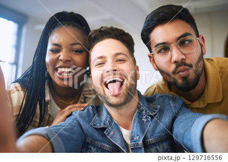 Comic, selfie and portrait of friends at university with funny face expression in humor, fun and crazy picture. Education, diversity and happy group of students at college, school and academic campus Comic, selfie and portrait of friends at university with funny face expression in humor, fun and crazy picture. Education, diversity and happy group of students at college, school and academic campus 129716556