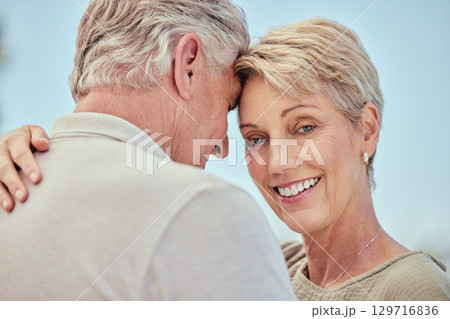 Senior couple, smile and dance with marriage, commitment and strong relationship, hug and face with romance outdoor. Mature, man and woman with love, happiness and trust with support in retirement. 129716836