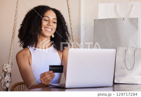 Credit card, laptop and online shopping, payment and bills in home, happy smile and sale promotion, discount and buy. Ecommerce, black woman and internet subscription upgrade, buying and banking Credit card, laptop and online shopping, payment and bills in home, happy smile and sale promotion, discount and buy. Ecommerce, black woman and internet subscription upgrade, buying and banking 129717284