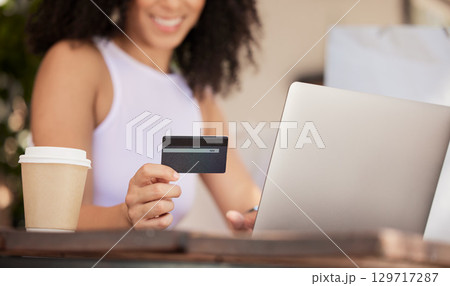 Online shopping, smile and woman with laptop and credit card surfing internet for Christmas gift in cafe. Ecommerce, shopping and black woman in coffee shop on online search for discount retail sale. Online shopping, smile and woman with laptop and credit card surfing internet for Christmas gift in cafe. Ecommerce, shopping and black woman in coffee shop on online search for discount retail sale. 129717287