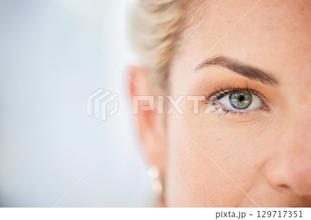 Half face, eyes and woman with mockup, focus and vision, awareness and natural cosmetics in Ireland. Closeup portrait of female, lady and seeing human with mock up, healthy perception and eye test 129717351