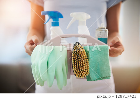Woman, hands or cleaning container with spray bottle, rubber gloves or fabric for hygiene maintenance, virus security or compliance. Zoom, maid or cleaner service worker with product for housekeeping 129717423
