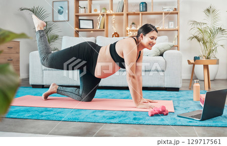 Yoga, pregnant woman and meditation with laptop, online class and lounge for wellness or fitness. Pregnancy, device or lady with peace, zen or calm to relax, tutorial or workout for exercise or smile Yoga, pregnant woman and meditation with laptop, online class and lounge for wellness or fitness. Pregnancy, device or lady with peace, zen or calm to relax, tutorial or workout for exercise or smile 129717561
