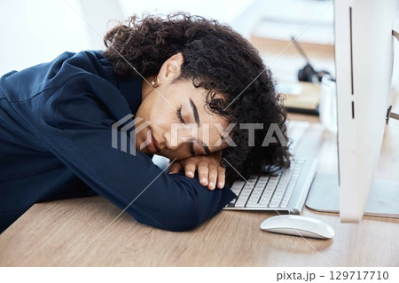 Sleeping, office and business woman burnout from finance portfolio work, stock market database or investment budget. Fatigue, forex account manager or trader tired from NFT, bitcoin or crypto trading 129717710