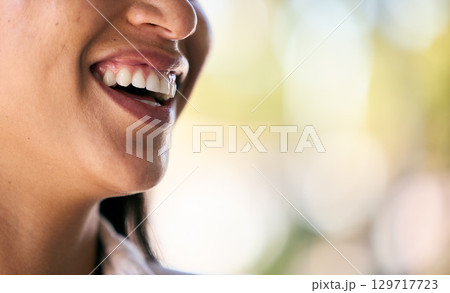 Dental, teeth or mouth with a smile in nature laughing after a successful teeth whitening at dentist appointment. Mockup space, zoom or happy woman smiling at a funny joke while relaxing outdoors Dental, teeth or mouth with a smile in nature laughing after a successful teeth whitening at dentist appointment. Mockup space, zoom or happy woman smiling at a funny joke while relaxing outdoors 129717723