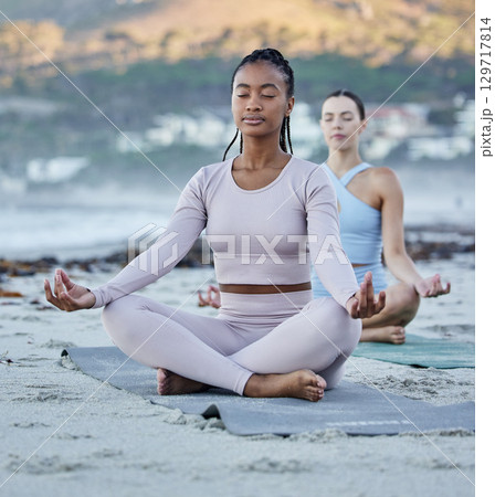 Beach meditation, diversity and yoga women meditate for chakra energy healing of soul, aura or spiritual balance. Freedom, lotus and zen people relax on sand for mindset peace, pilates or mindfulness Beach meditation, diversity and yoga women meditate for chakra energy healing of soul, aura or spiritual balance. Freedom, lotus and zen people relax on sand for mindset peace, pilates or mindfulness 129717814