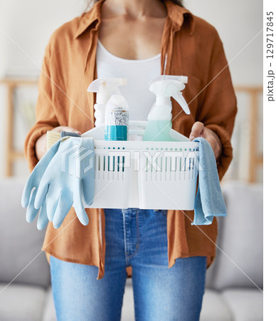 Cleaning service, product basket and cleaner hands for living room home, startup employee with plastic bottle, container and cloth. Woman, hygiene liquid and bacteria spray for spring cleaning career Cleaning service, product basket and cleaner hands for living room home, startup employee with plastic bottle, container and cloth. Woman, hygiene liquid and bacteria spray for spring cleaning career 129717845