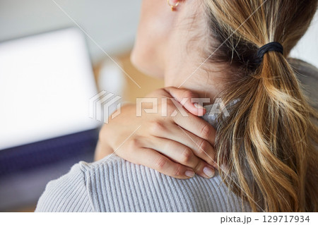 Business woman, stress and laptop with neck pain, tired and injury from working or strain in office. Burnout, overworked and stressed female worker massage sore, ache and muscle in neck in workplace Business woman, stress and laptop with neck pain, tired and injury from working or strain in office. Burnout, overworked and stressed female worker massage sore, ache and muscle in neck in workplace 129717934